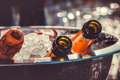beer and Champagne Bottles in an ice bucket 